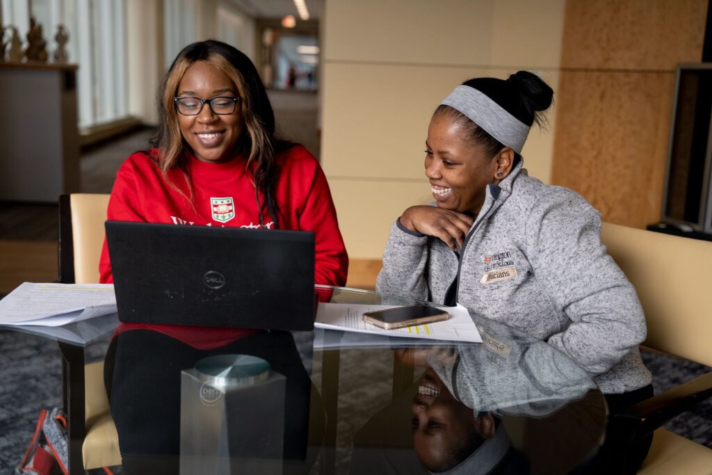 De'Ona Hardy, left, and Erica Jenkins study together.